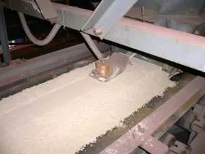 Moisture sensor in industrial ore